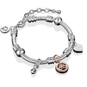 NEWBRIDGE SILVERPLATE CHARM BRACELET